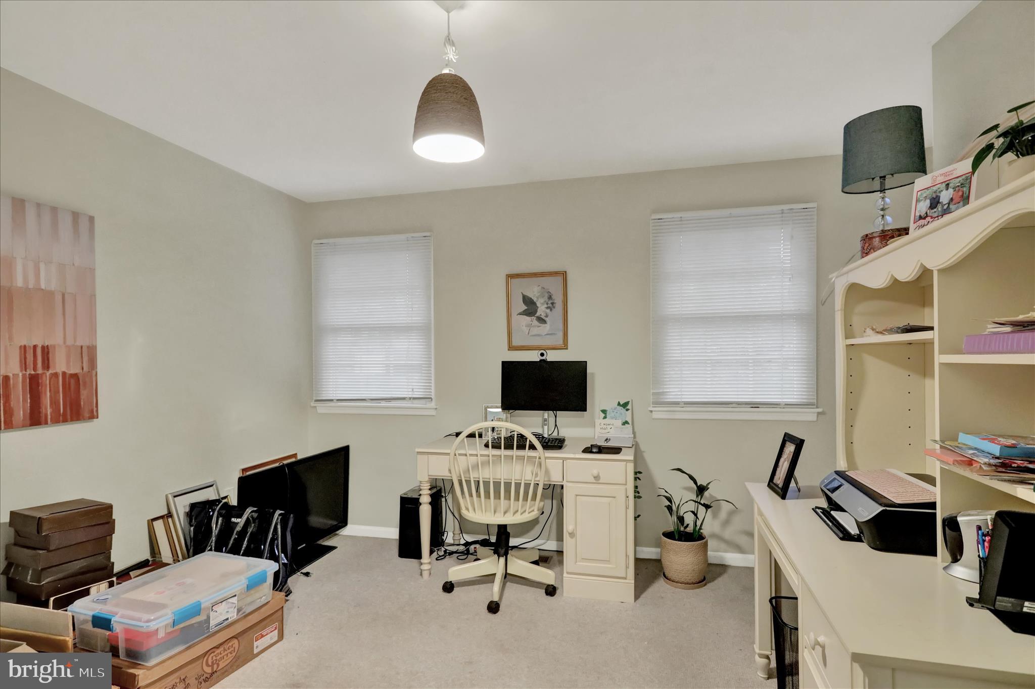 314 Fairview Road Reading, PA 19606 - Photo 29 of 45 a work room with furniture a flat screen tv and a window