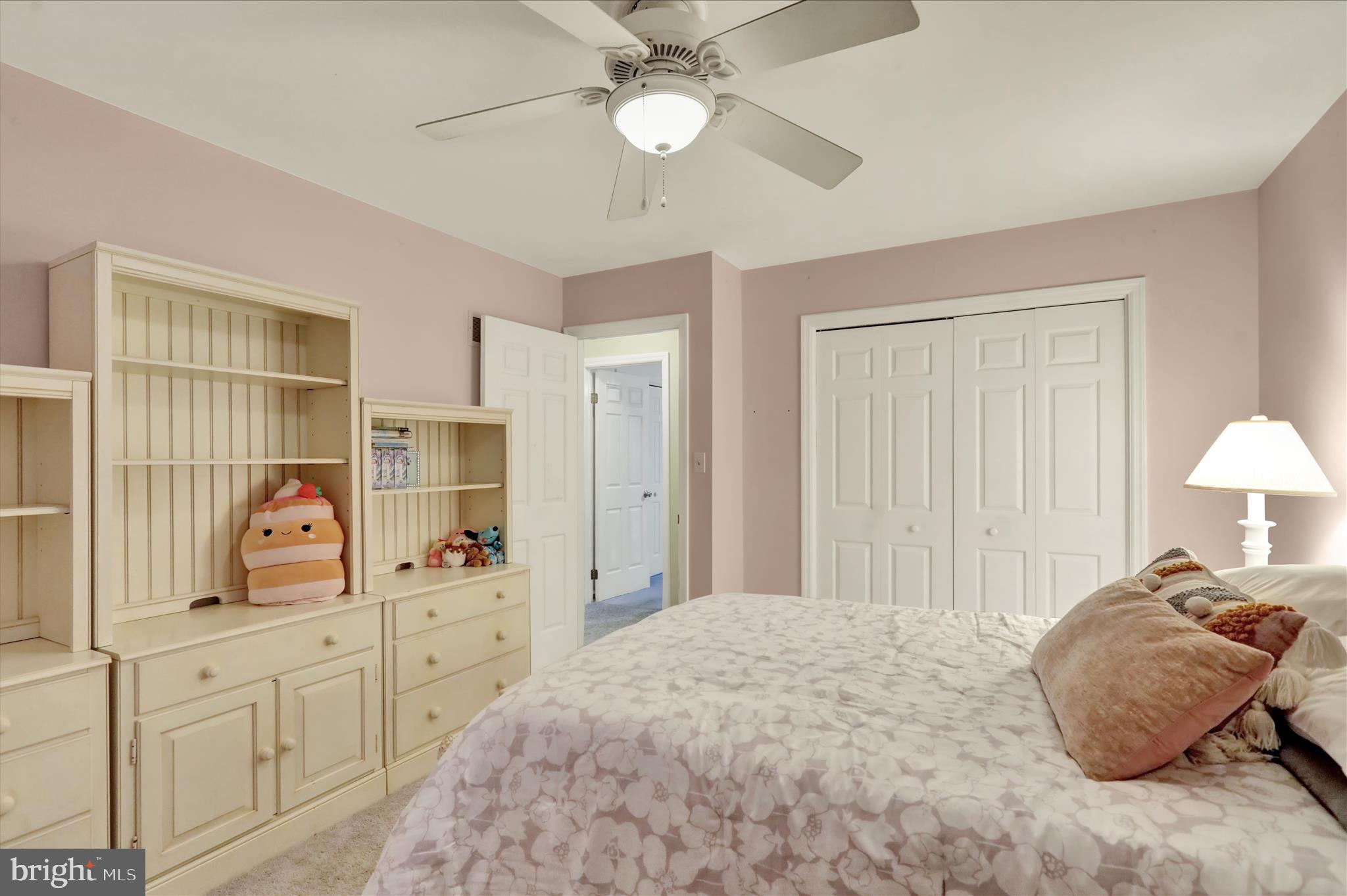 314 Fairview Road Reading, PA 19606 - Photo 31 of 45 a bedroom with a bed and a chandelier