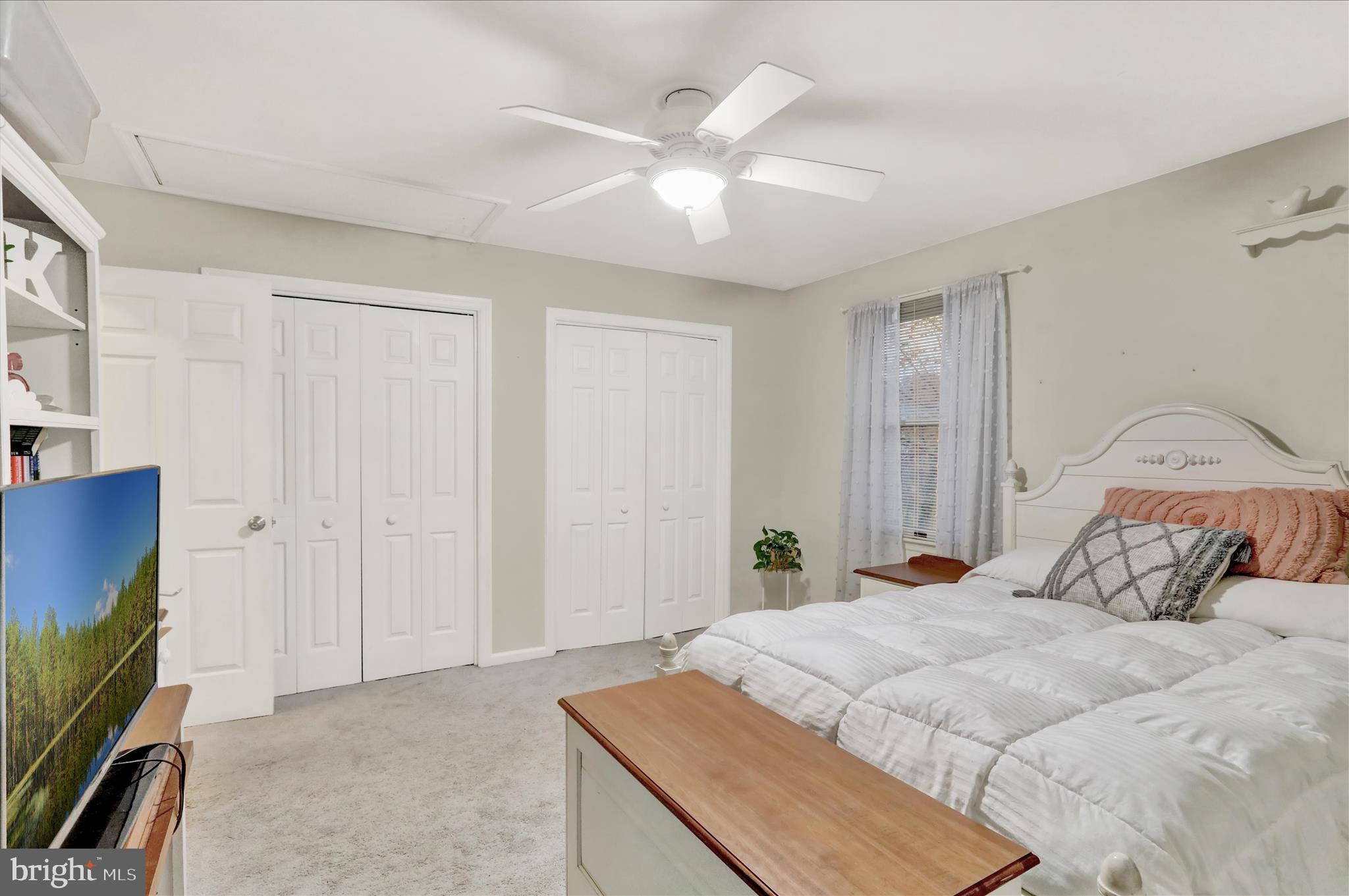 314 Fairview Road Reading, PA 19606 - Photo 33 of 45 a bedroom with a bed and a flat screen tv