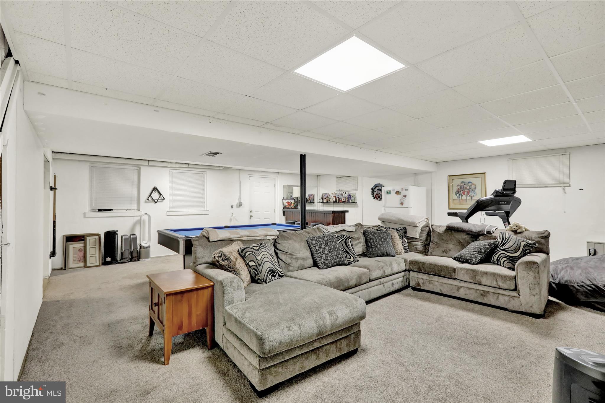 314 Fairview Road Reading, PA 19606 - Photo 34 of 45 a living room with furniture and a fireplace