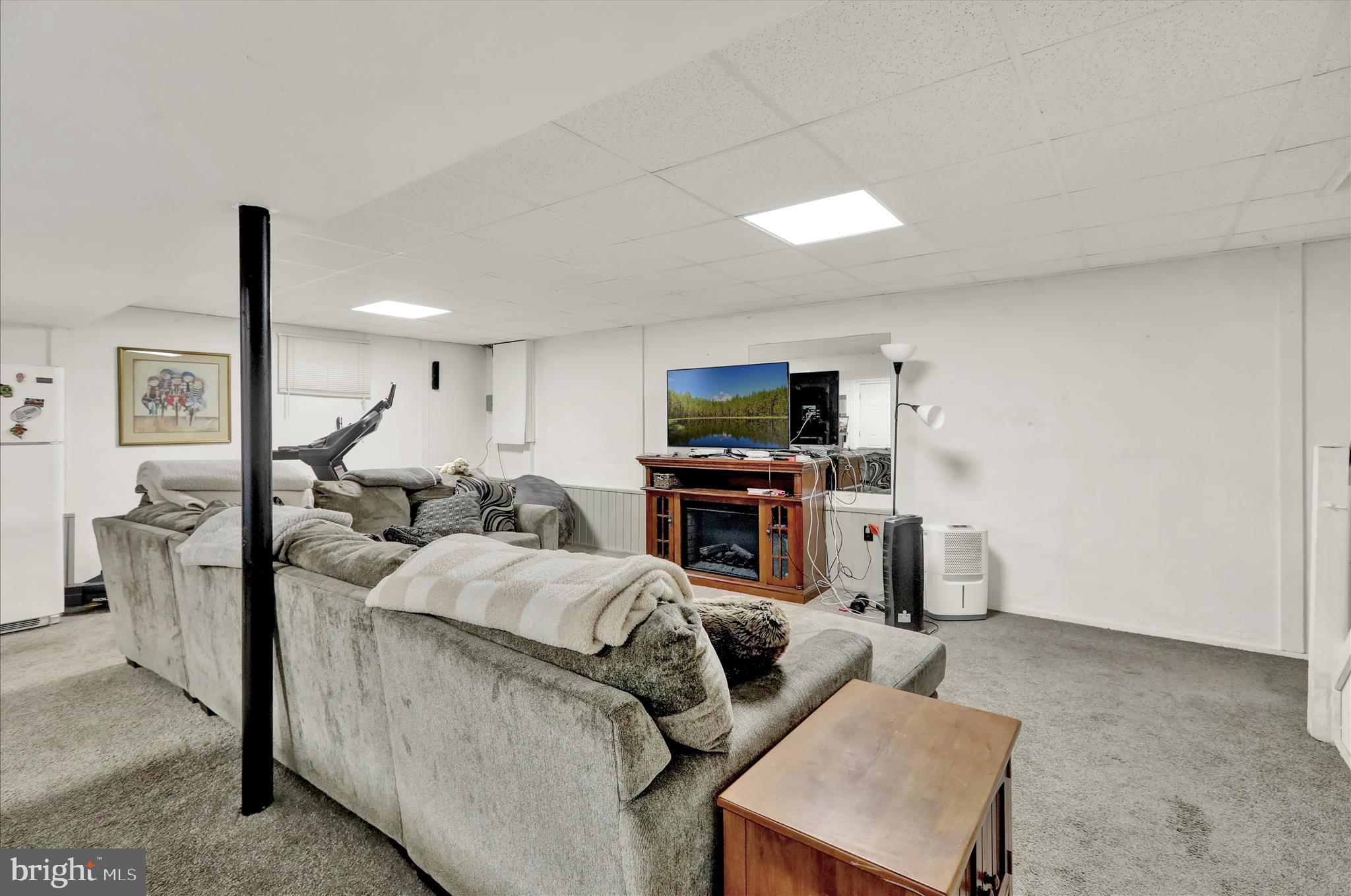 314 Fairview Road Reading, PA 19606 - Photo 36 of 45 a living room with furniture and a flat screen tv
