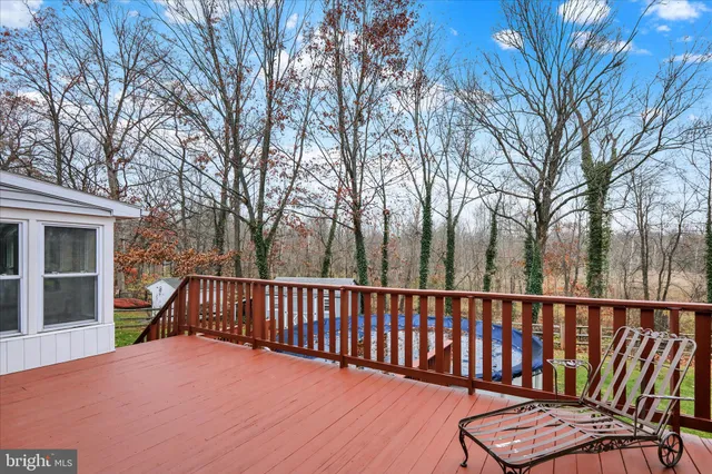 a view of a wooden roof deck