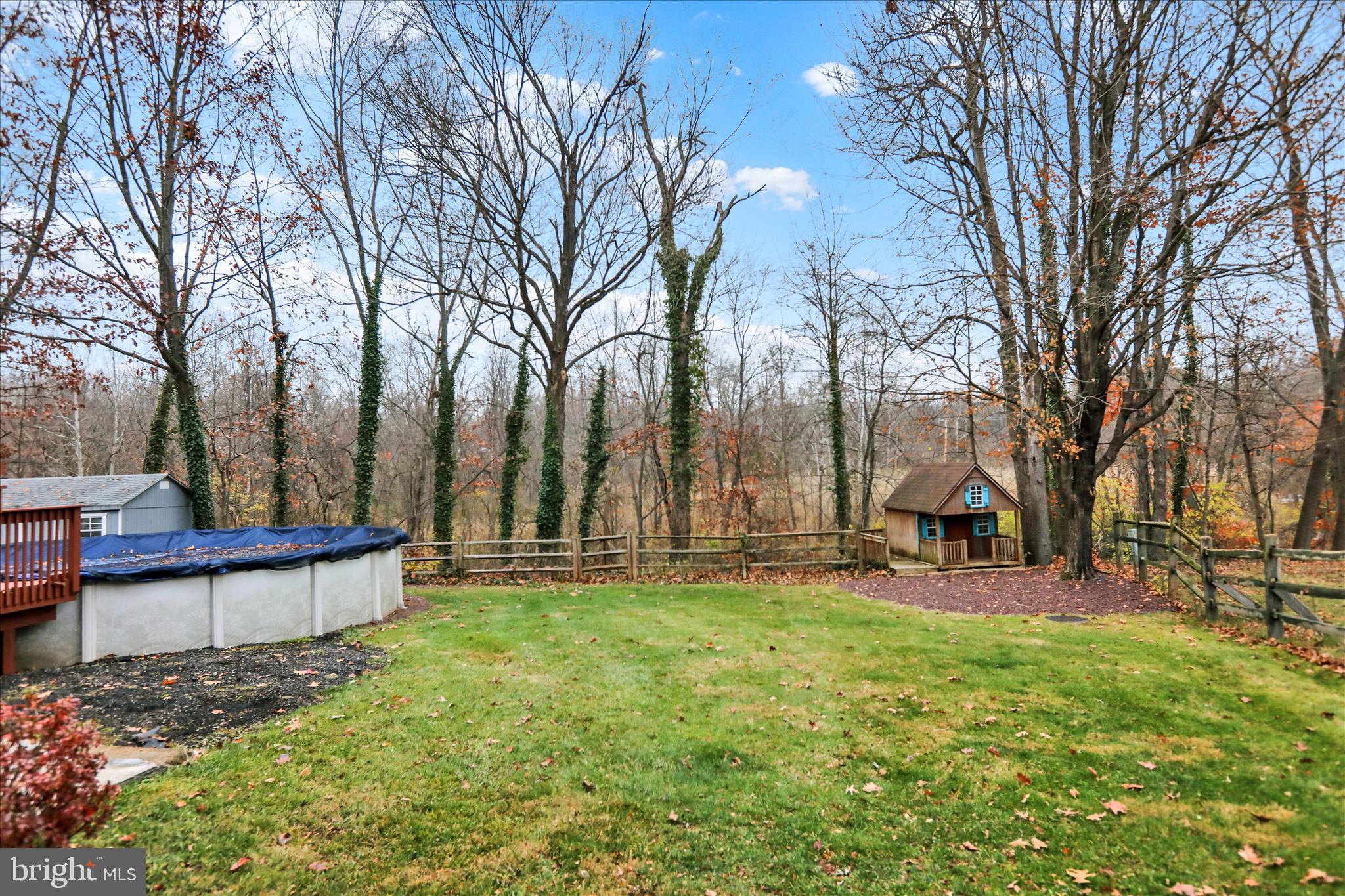 314 Fairview Road Reading, PA 19606 - Photo 43 of 45 a view of backyard with table and chairs and wooden fence