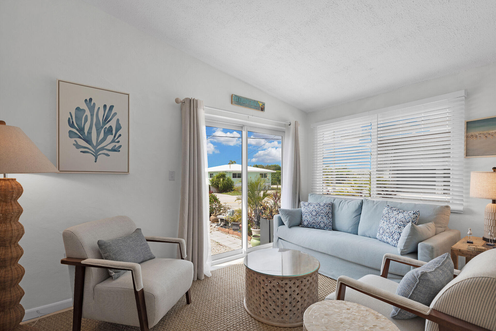 10 Clara Boulevard Marathon, FL 33051 - Photo 1 of 25 a living room with furniture and a large window