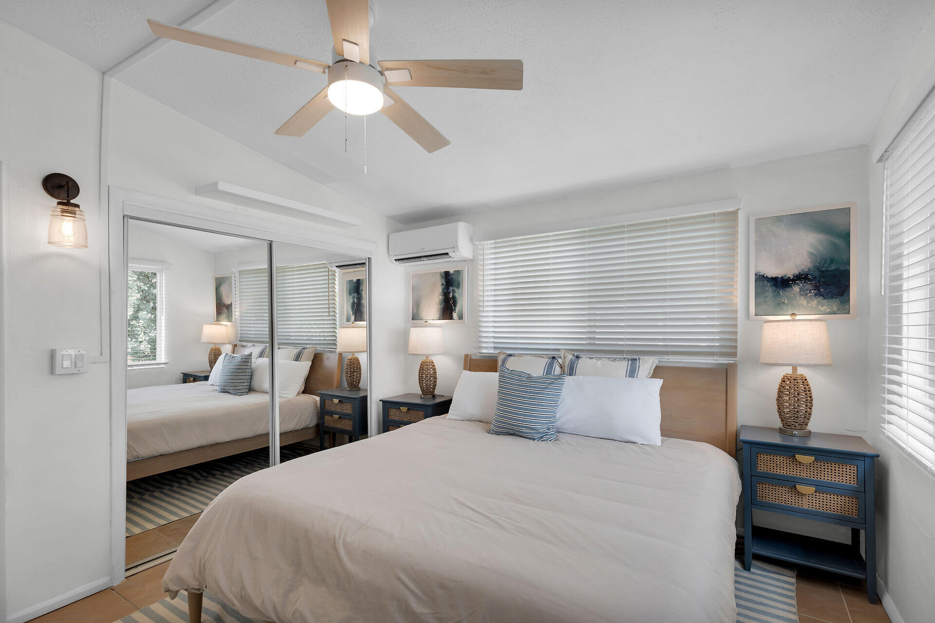 10 Clara Boulevard Marathon, FL 33051 - Photo 14 of 25 a bedroom with bed and a chandelier