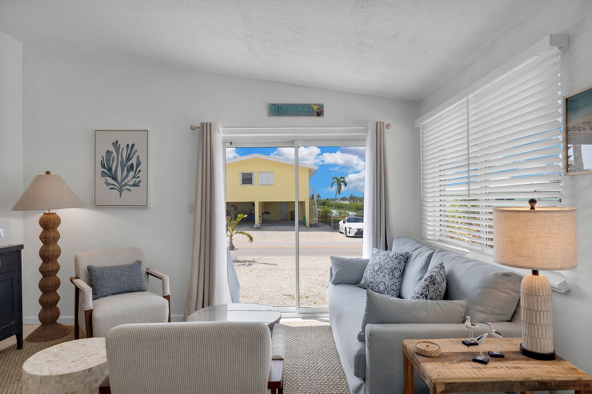 10 Clara Boulevard Marathon, FL 33051 - Photo 2 of 25 a living room with furniture and a large window