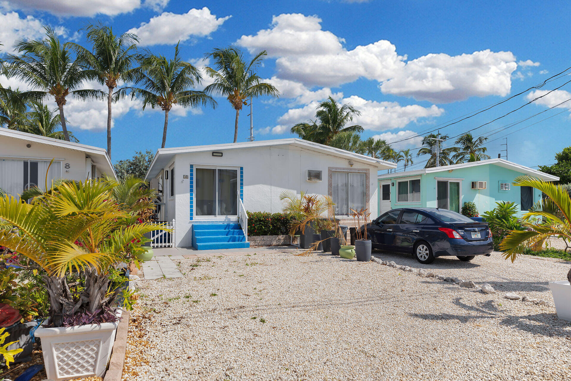 10 Clara Boulevard Marathon, FL 33051 - Photo 23 of 25 a front view of a house with a yard and chandelier