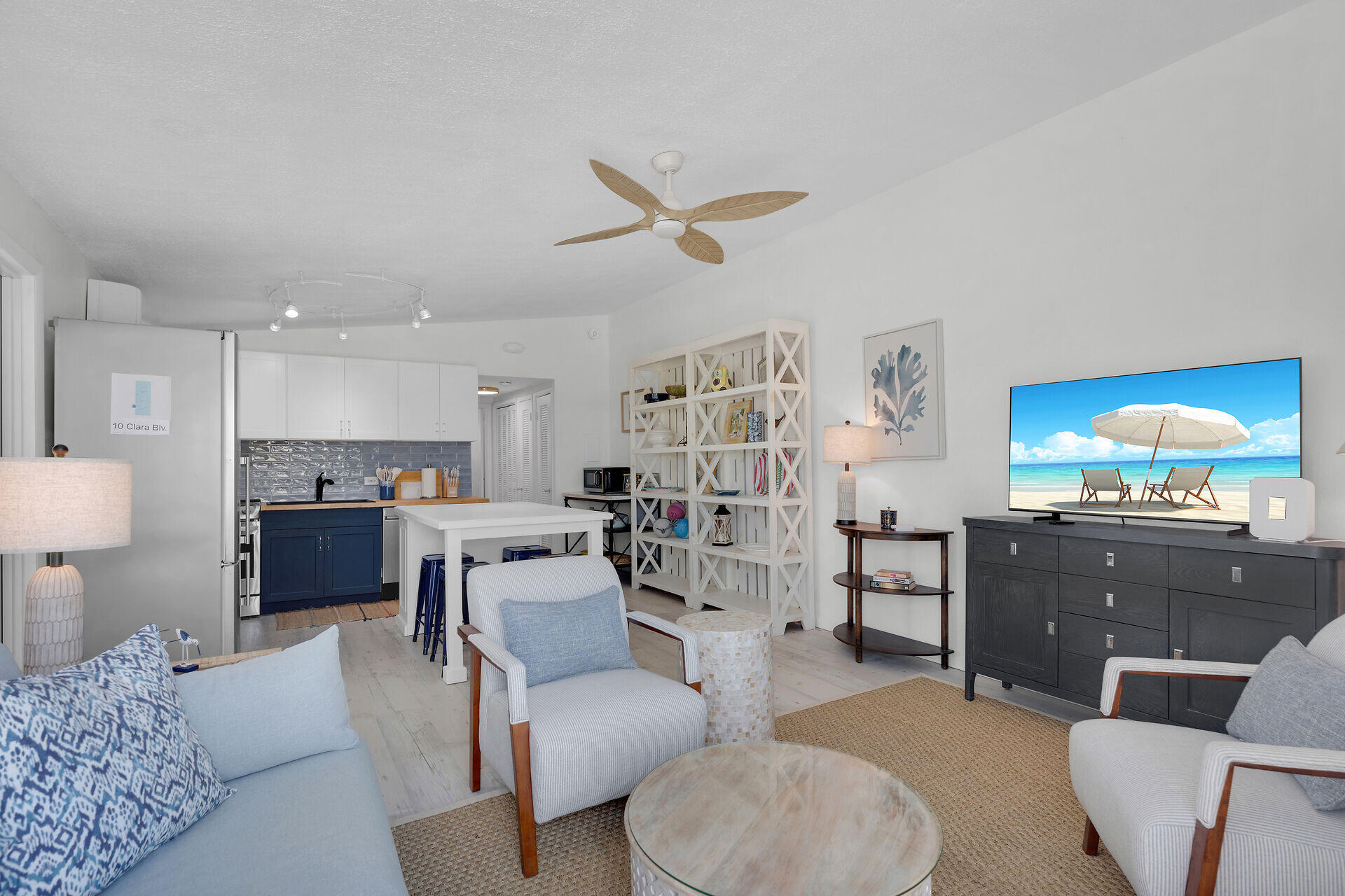 10 Clara Boulevard Marathon, FL 33051 - Photo 4 of 25 a living room with furniture kitchen view and a lamp