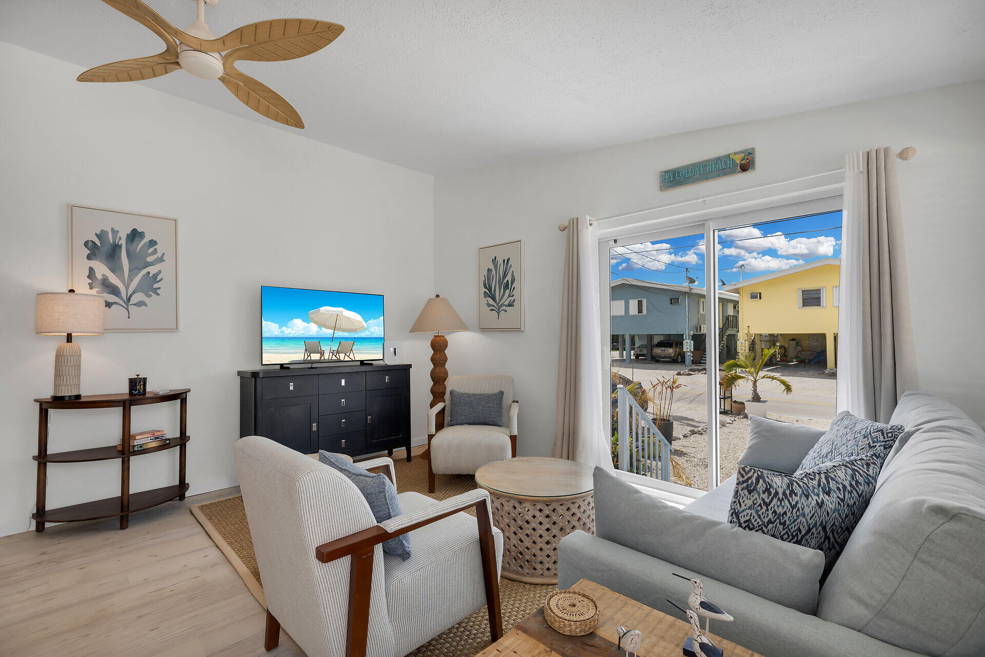 10 Clara Boulevard Marathon, FL 33051 - Photo 6 of 25 a living room with furniture and a flat screen tv
