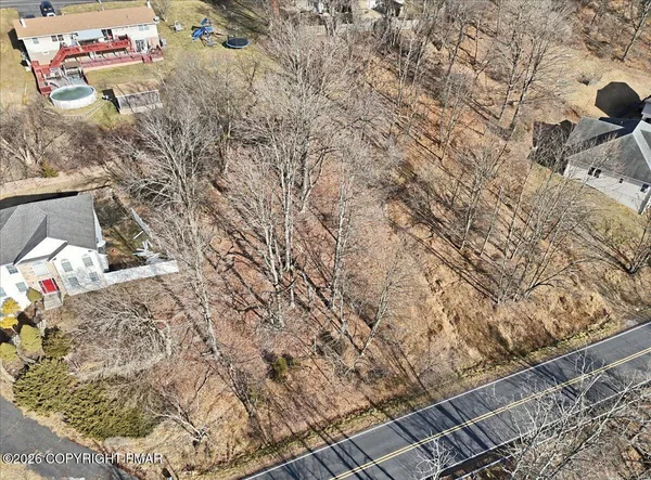 an aerial view of residential building and lake view