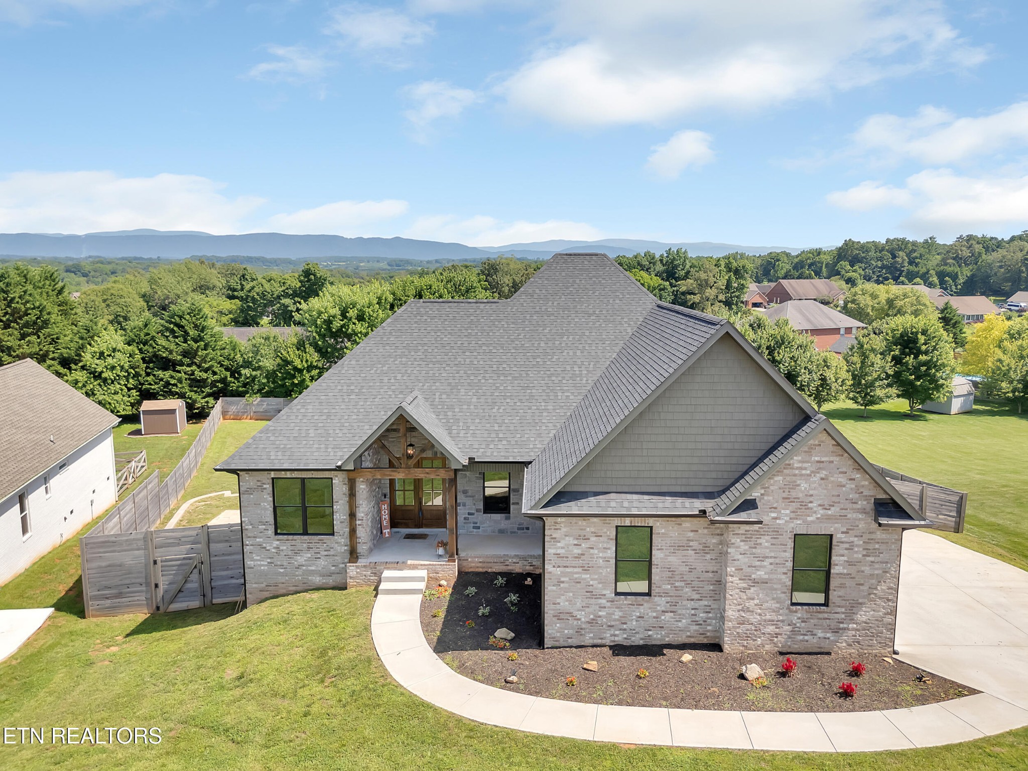 1216 Houston Springs Road Greenback, TN 37742 - Photo 1 of 57 an aerial view of a house with swimming pool and furniture