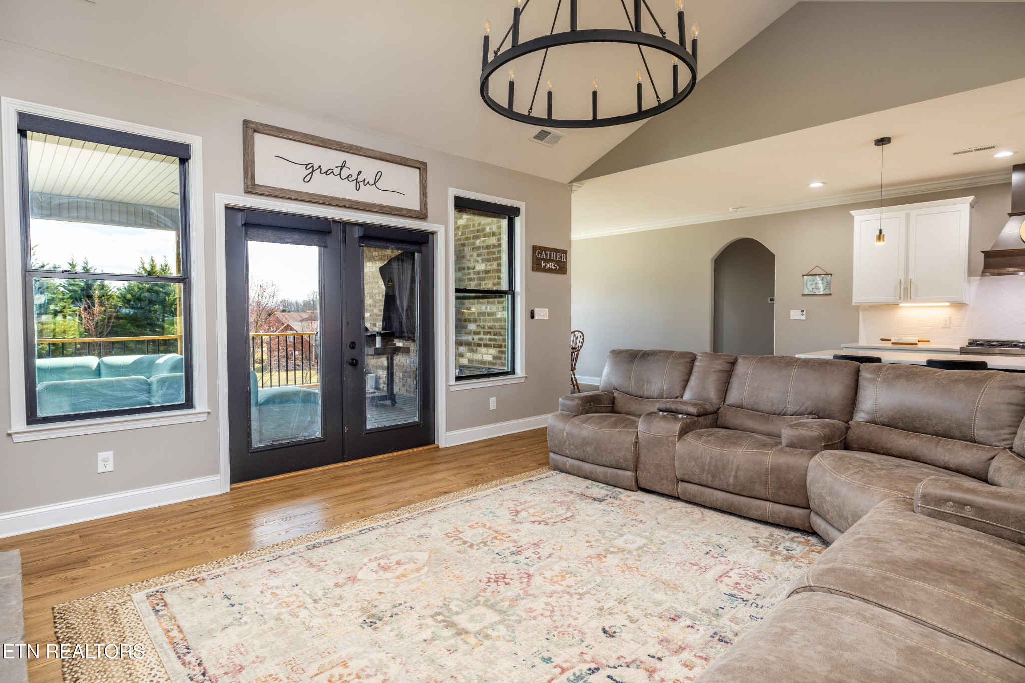 1216 Houston Springs Road Greenback, TN 37742 - Photo 12 of 57 a living room with furniture a window and a chandelier