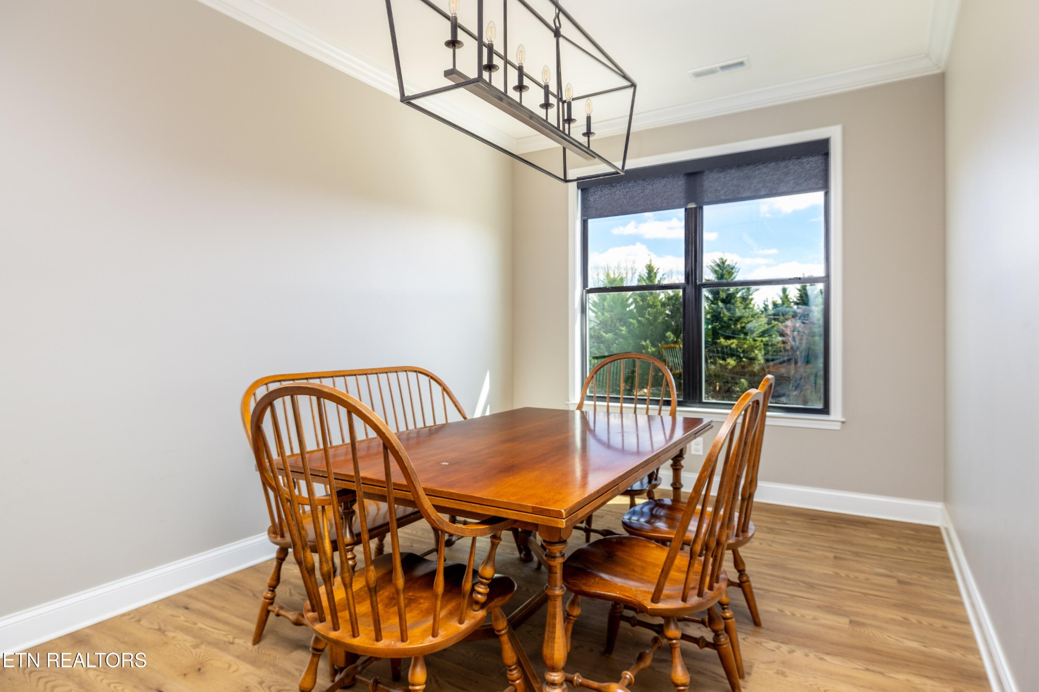 1216 Houston Springs Road Greenback, TN 37742 - Photo 23 of 57 a view of a dining room with furniture and wooden floor