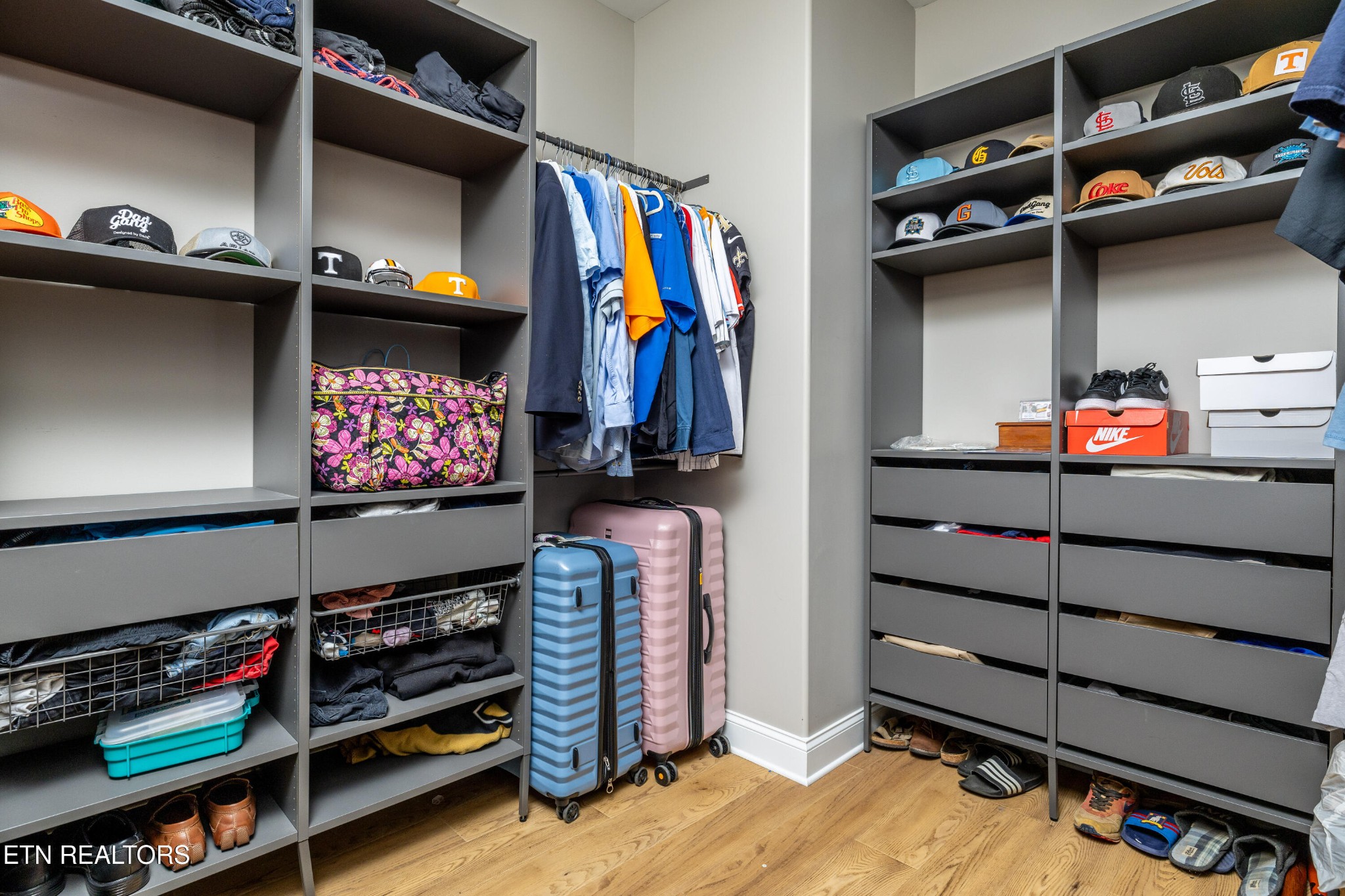 1216 Houston Springs Road Greenback, TN 37742 - Photo 30 of 57 a view of walk in closet with clothes and shoes