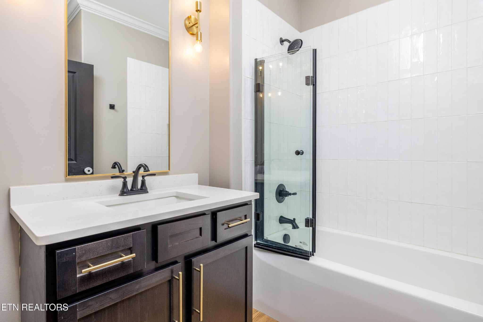 1216 Houston Springs Road Greenback, TN 37742 - Photo 33 of 57 a bathroom with a sink a mirror and a bathtub