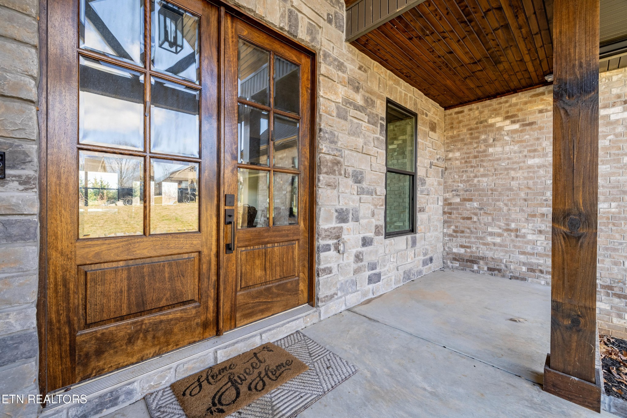 1216 Houston Springs Road Greenback, TN 37742 - Photo 7 of 57 a view of outdoor space with sliding door and wooden floor