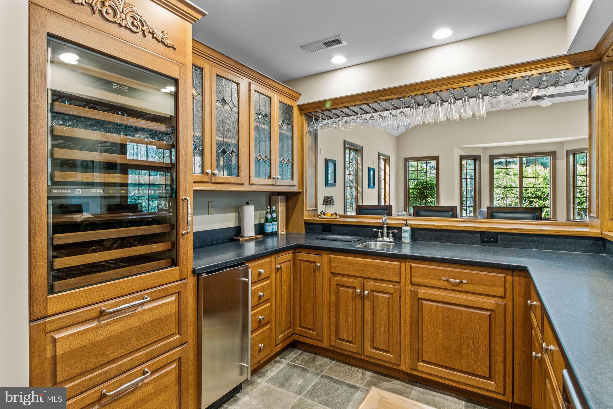 164 Welsh Road Huntingdon Valley, PA 19006 - Photo 20 of 75 Sub Zero beverage fridge, ice machine, sink.