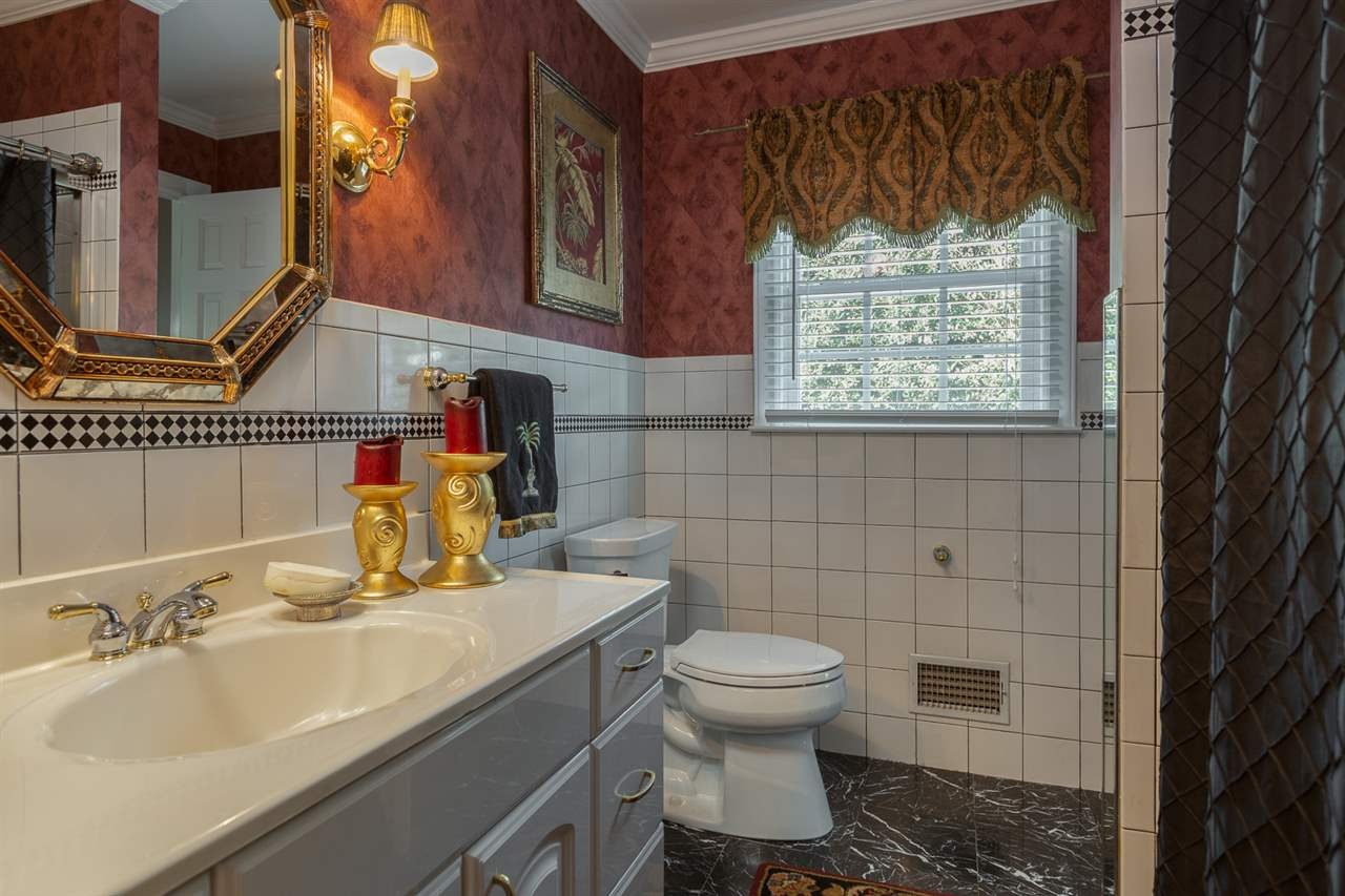 1405 Pony Run Road Raleigh, NC 27615 - Photo 4 of 28 POWDER ROOM/FULL BATH MAIN LEVEL