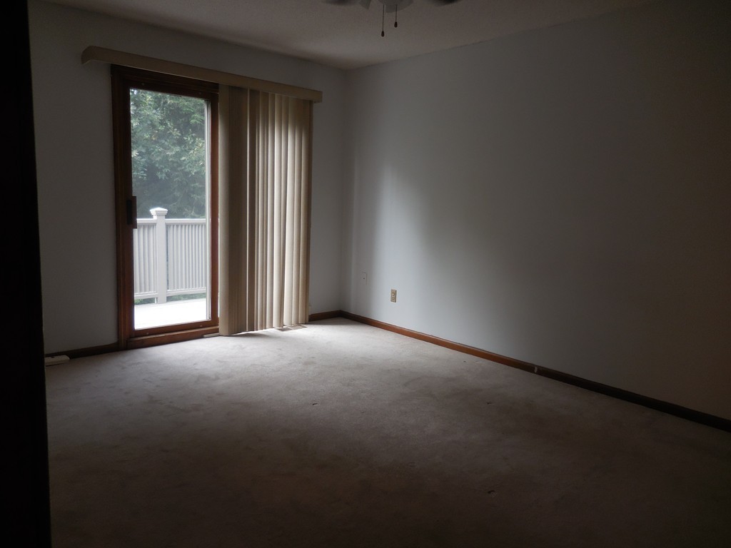 419 Southwick Road, Unit P64 Westfield, MA 01085 - Photo 12 of 14 a view of empty room with windows