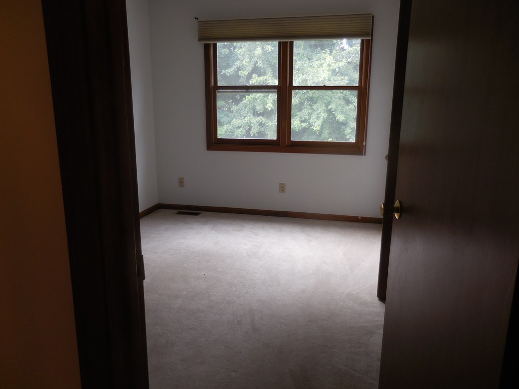 419 Southwick Road, Unit P64 Westfield, MA 01085 - Photo 9 of 14 an empty room with a window