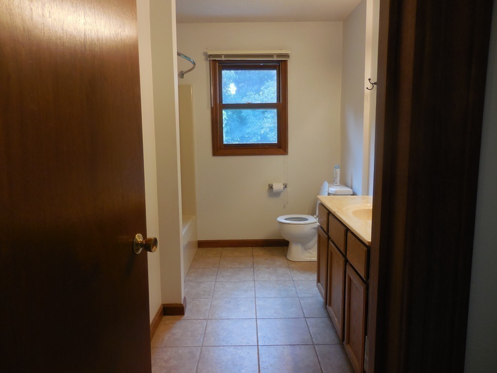 419 Southwick Road, Unit P64 Westfield, MA 01085 - Photo 10 of 14 a bathroom with a toilet