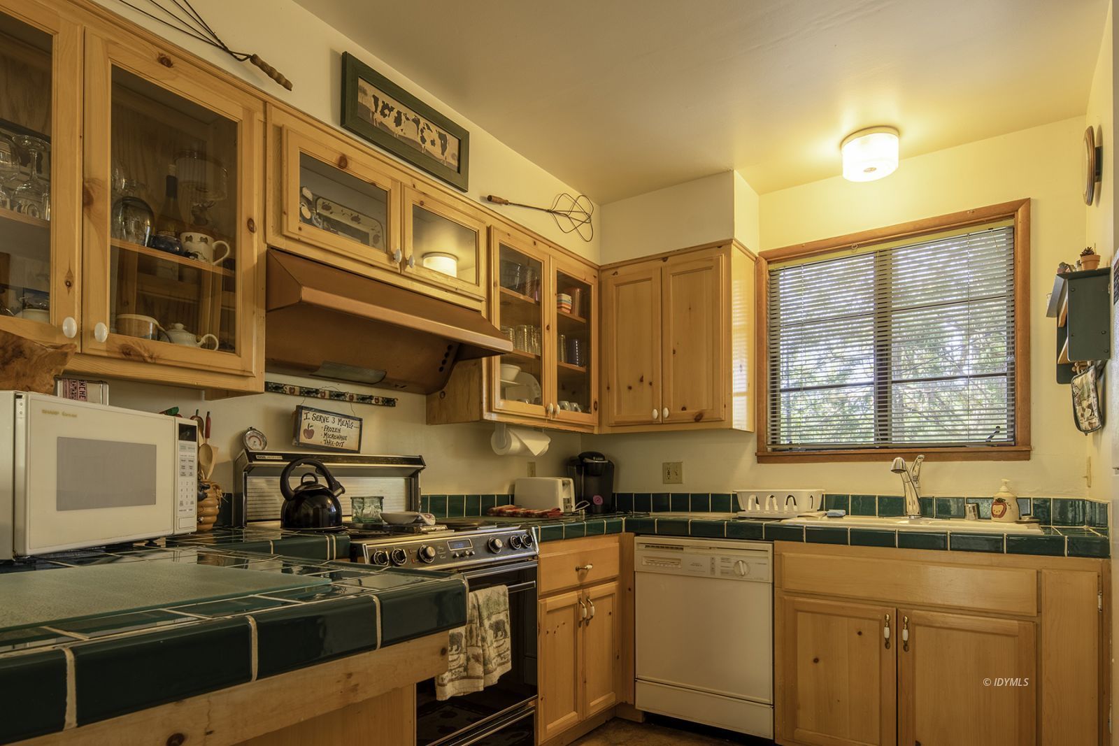 25180 Glen Road Idyllwild, CA 92549 - Photo 8 of 45 a kitchen with stainless steel appliances granite countertop a sink and stove