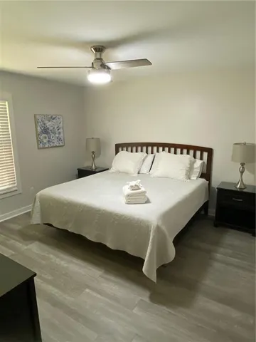 a living room with furniture and flat screen tv