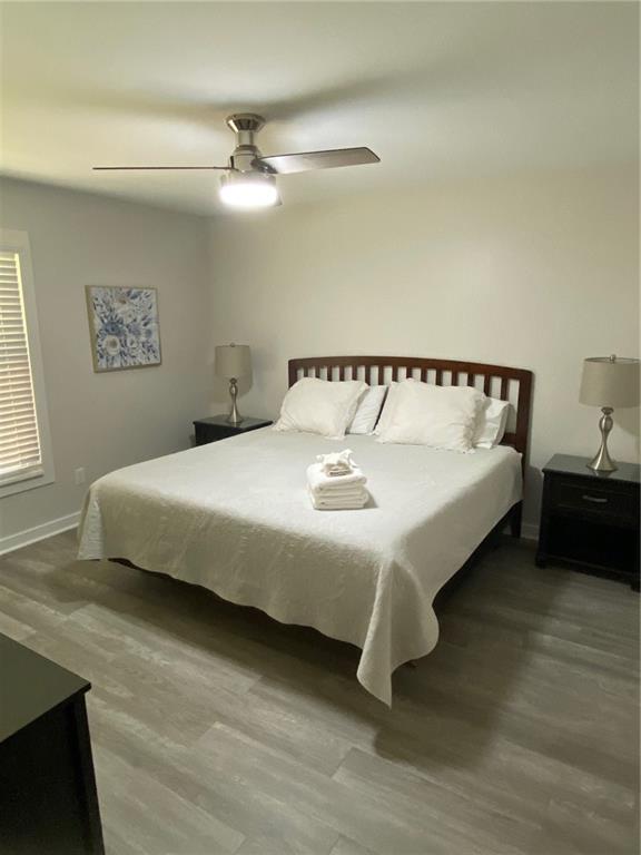 1608 Willie Drive Marietta, GA 30062 - Photo 15 of 35 a bed sitting in a bedroom next to a window