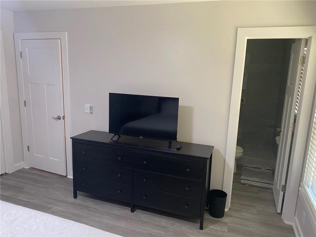1608 Willie Drive Marietta, GA 30062 - Photo 16 of 35 a living room with furniture and flat screen tv