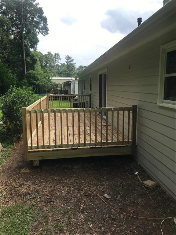 1608 Willie Drive Marietta, GA 30062 - Photo 30 of 35 a view of a wooden deck