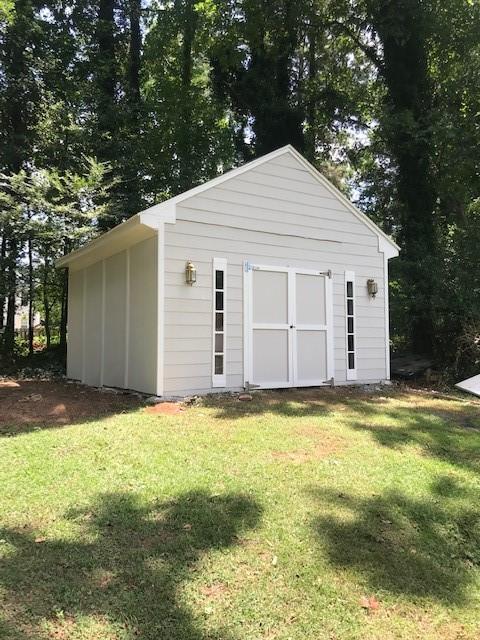 1608 Willie Drive Marietta, GA 30062 - Photo 33 of 35 a view of a backyard with large trees