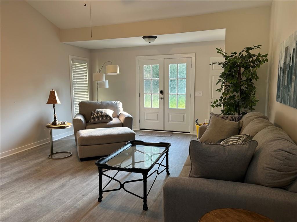 1608 Willie Drive Marietta, GA 30062 - Photo 6 of 35 a living room with furniture and a potted plant