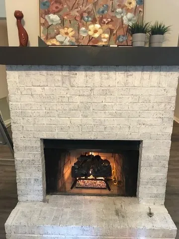 a kitchen with a refrigerator stove and microwave