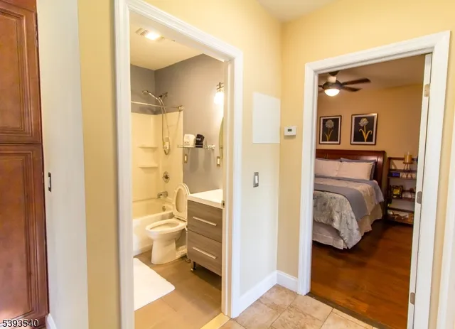 a view of a bedroom from a hallway