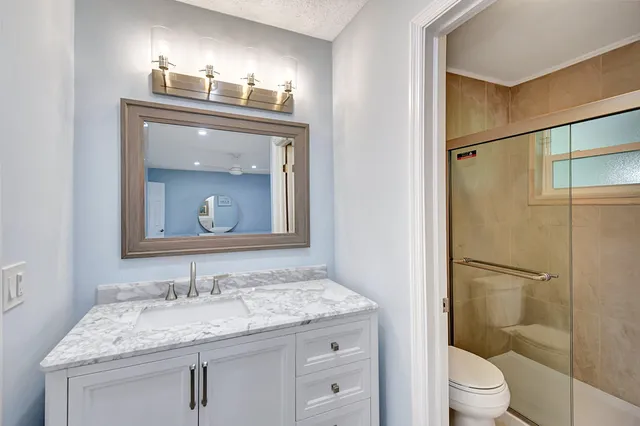 a view of a living room with a flat screen tv