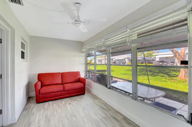 a view of an empty room and window