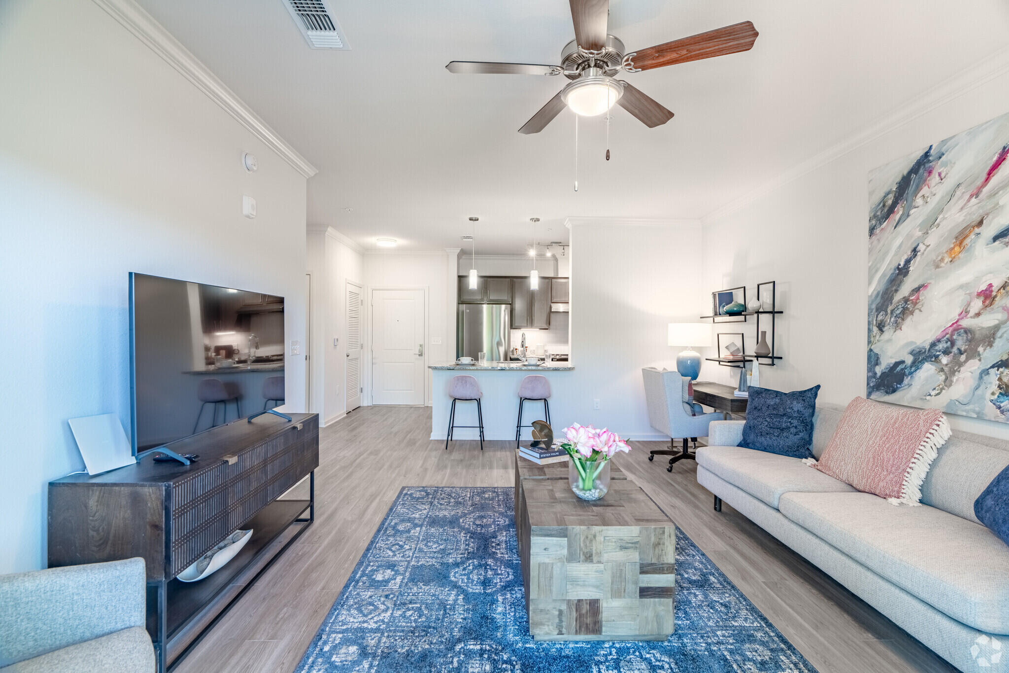 1924 Northwest Federal Highway, Unit 2101 Stuart, FL 34994 - Photo 6 of 16 a living room with furniture and a couch