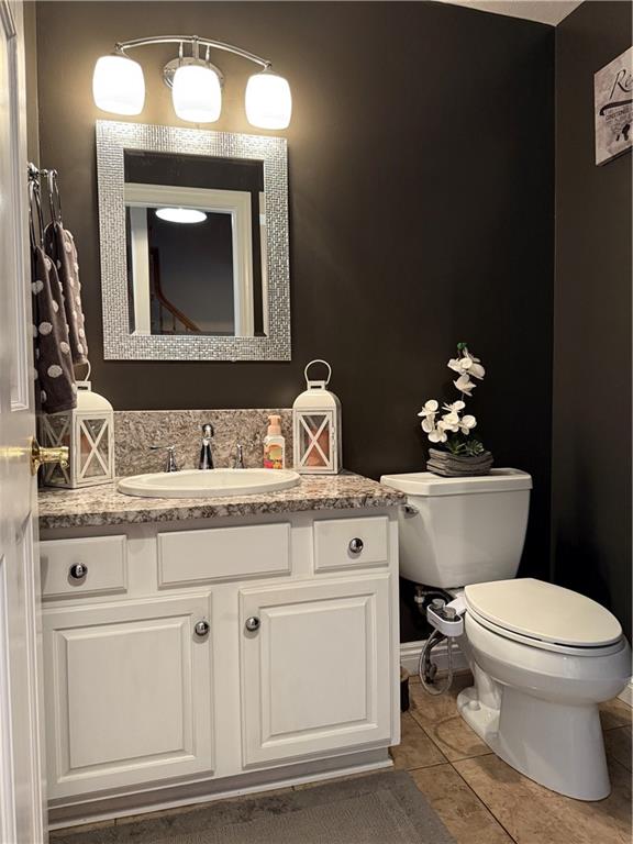 293 Sandy Hill Road Valencia, PA 16059 - Photo 32 of 50 a bathroom with a toilet a sink and mirror
