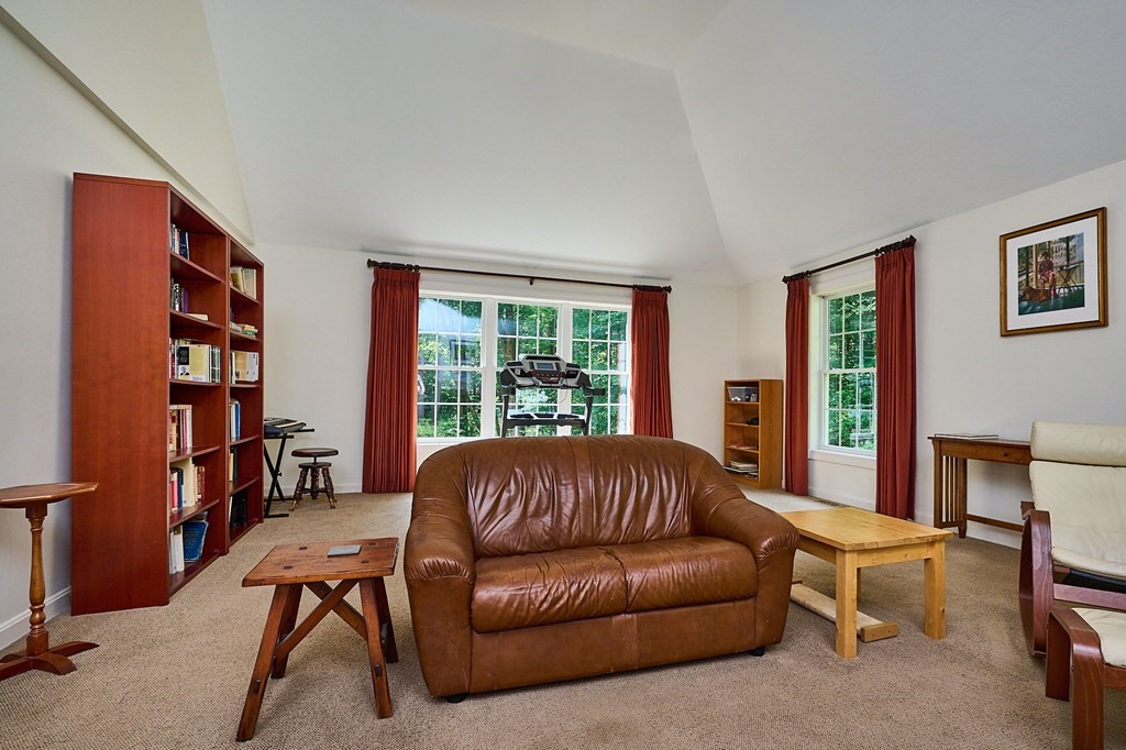 37 Shattuck Road Hadley, MA 01035 - Photo 16 of 42 a living room with furniture and a window