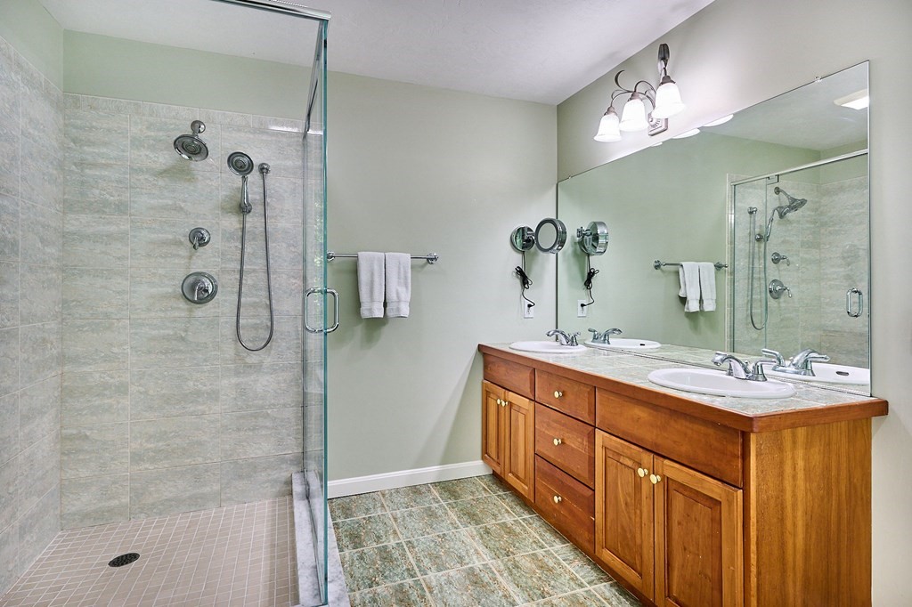 37 Shattuck Road Hadley, MA 01035 - Photo 23 of 42 a bathroom with a double vanity sink mirror double and shower