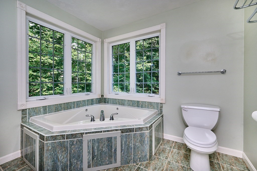 37 Shattuck Road Hadley, MA 01035 - Photo 24 of 42 a bathroom with a sink and a toilet