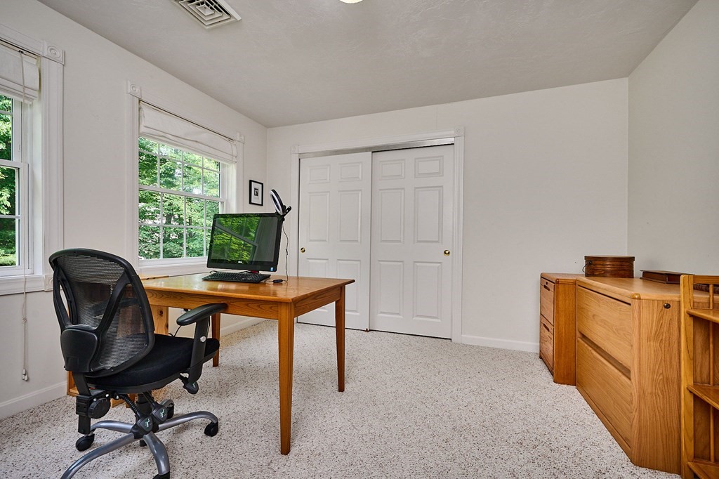 37 Shattuck Road Hadley, MA 01035 - Photo 25 of 42 a view of a workspace with furniture and a window