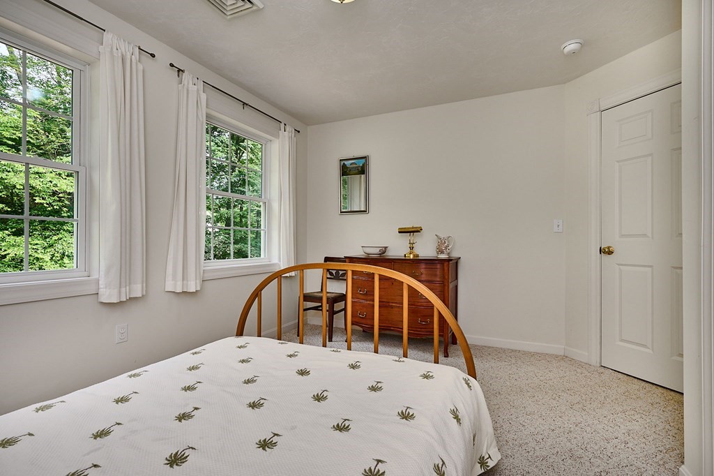37 Shattuck Road Hadley, MA 01035 - Photo 27 of 42 a bedroom with a bed and a window