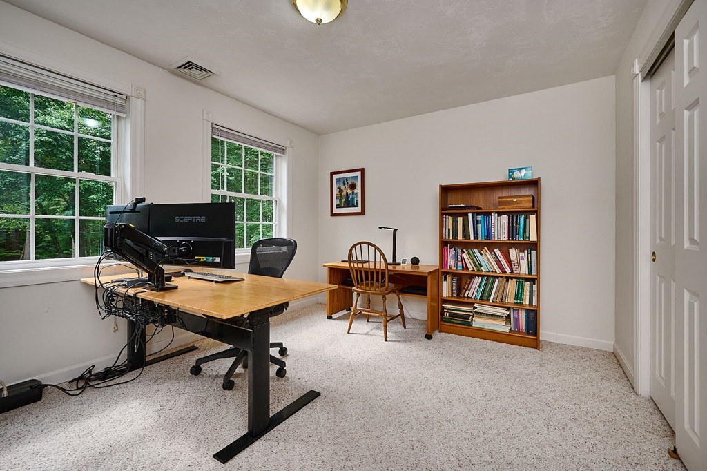 37 Shattuck Road Hadley, MA 01035 - Photo 28 of 42 a view of a workspace with furniture and a window