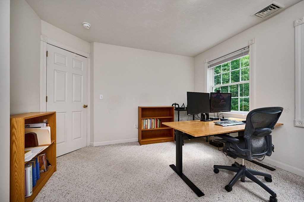 37 Shattuck Road Hadley, MA 01035 - Photo 29 of 42 a view of a workspace with furniture and a window