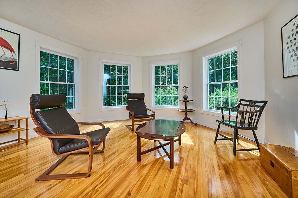 37 Shattuck Road Hadley, MA 01035 - Photo 3 of 42 a living room with furniture and a wooden floor