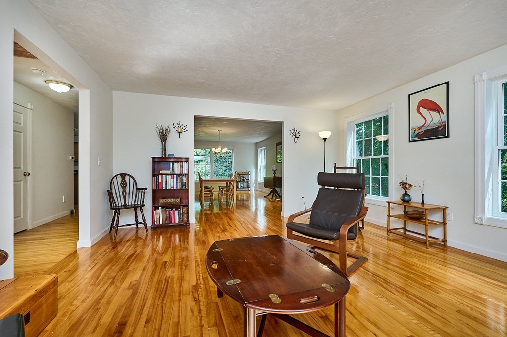 37 Shattuck Road Hadley, MA 01035 - Photo 4 of 42 a living room with furniture and a wooden floor