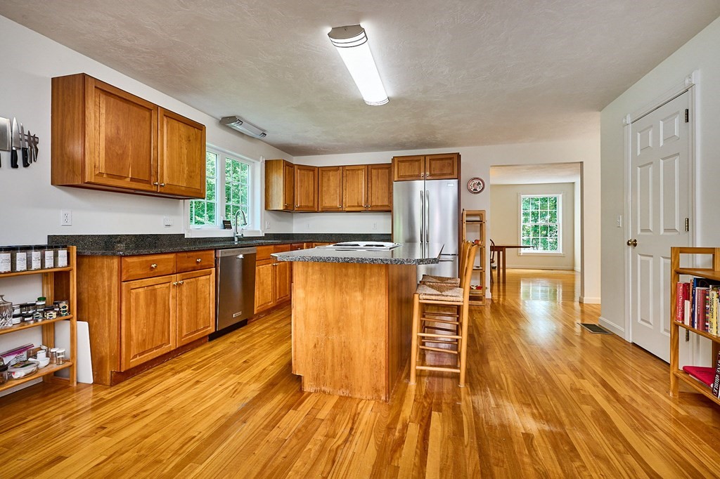 37 Shattuck Road Hadley, MA 01035 - Photo 7 of 42 a view of a kitchen with wooden floor and staircase