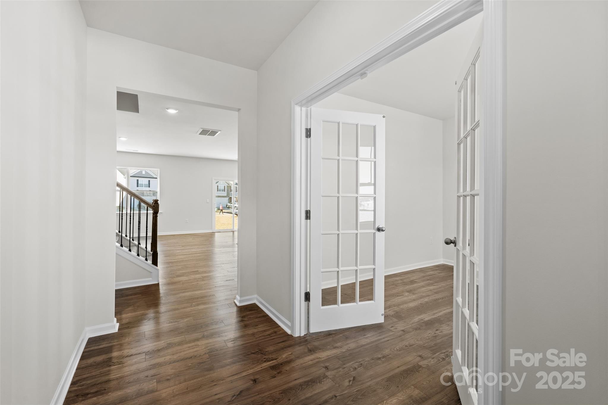 99 Bovine Br Road Fletcher, NC 28732 - Photo 12 of 29 a view of a hallway with wooden floor and entryway