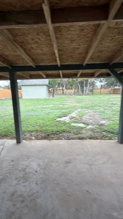 a view of a backyard of a house